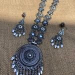 Oxidised Long Flower Necklace With Round Pendant