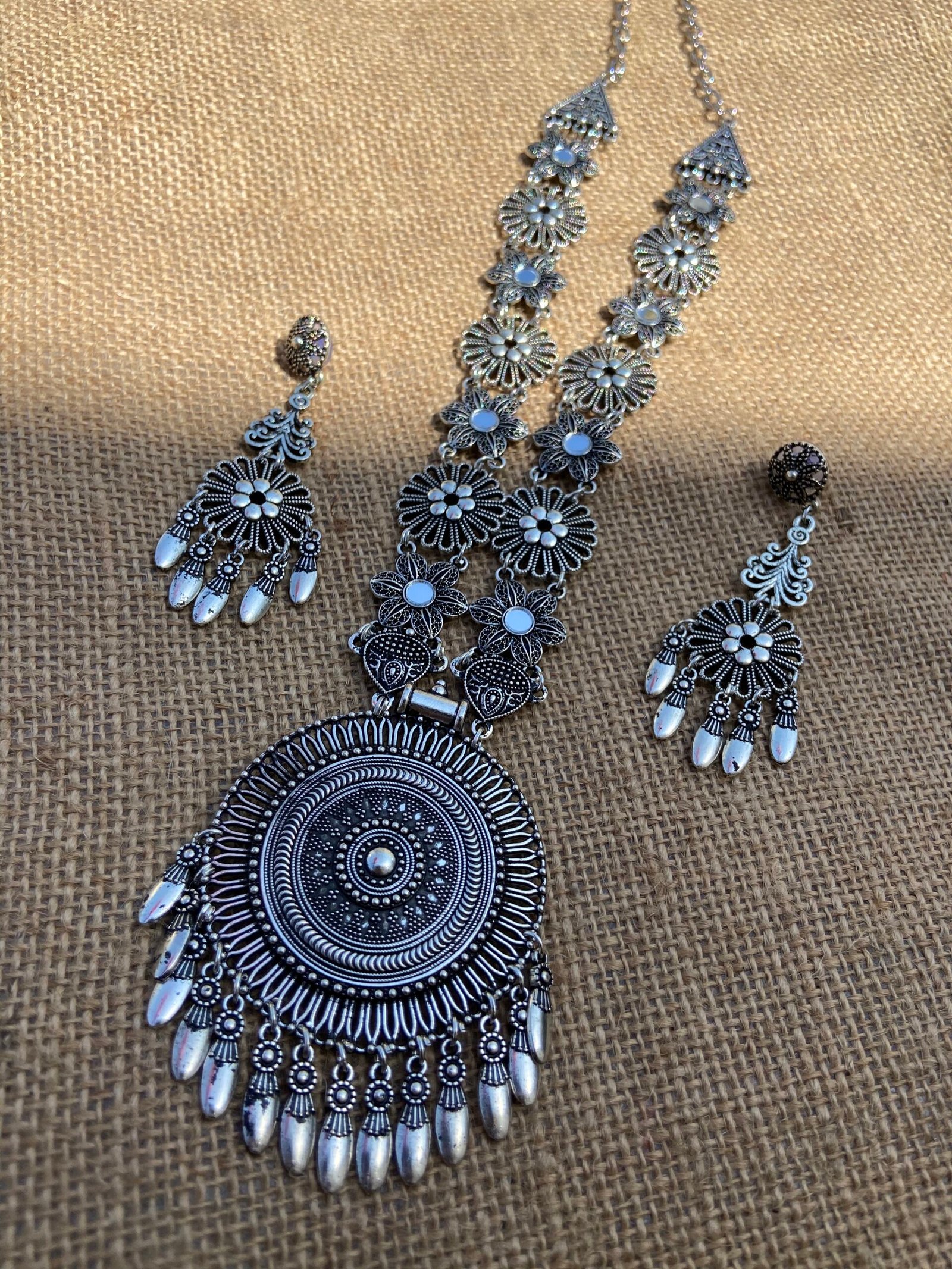 Oxidised Long Flower Necklace With Round Pendant