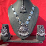 Oxidised German Silver Oval Mirror Set With Mangtika