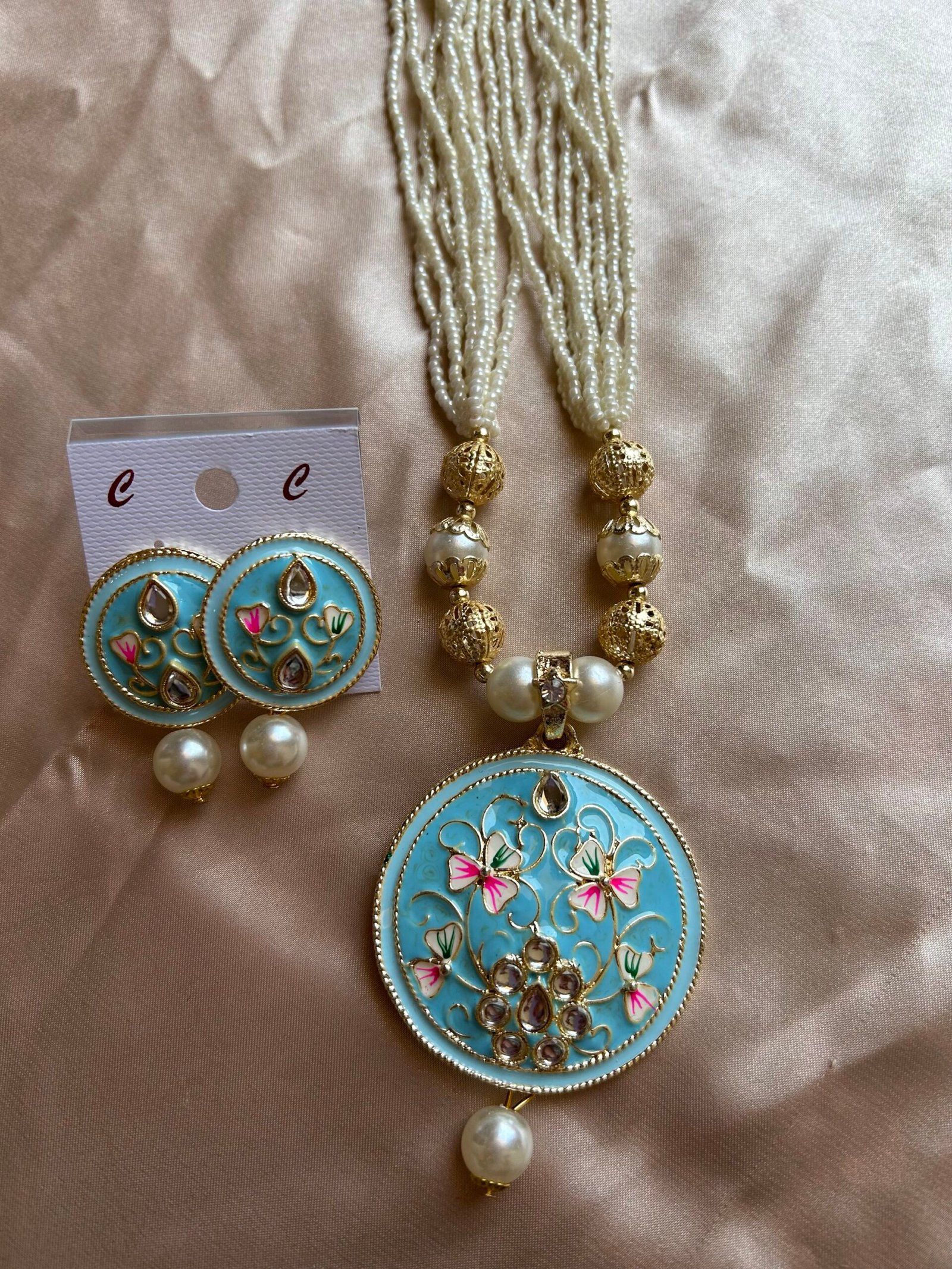 Long Moti Chir Mala With Sky Blue Pendant