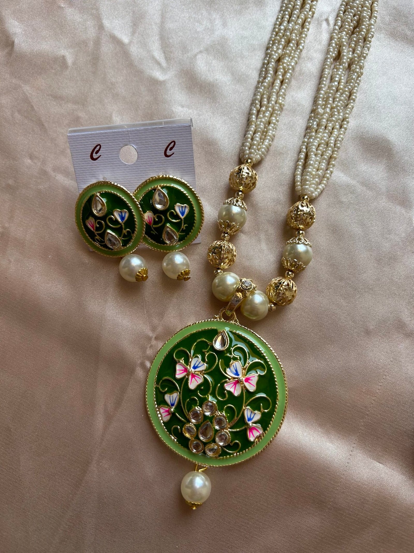Long Moti Chir Mala With Green Pendant