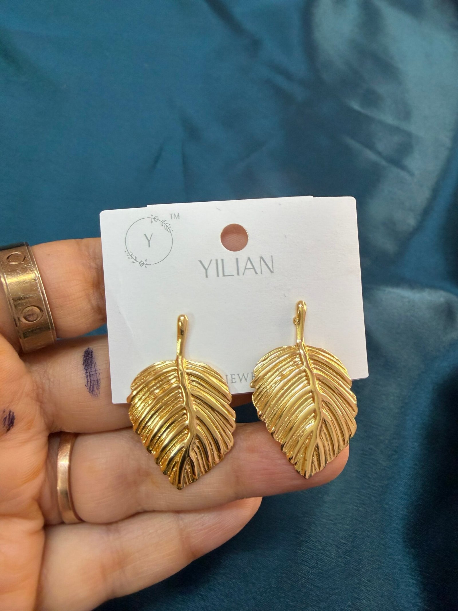 img_4456-scaled-1.jpeg Western Leaf Earrings - 11 - Image 1